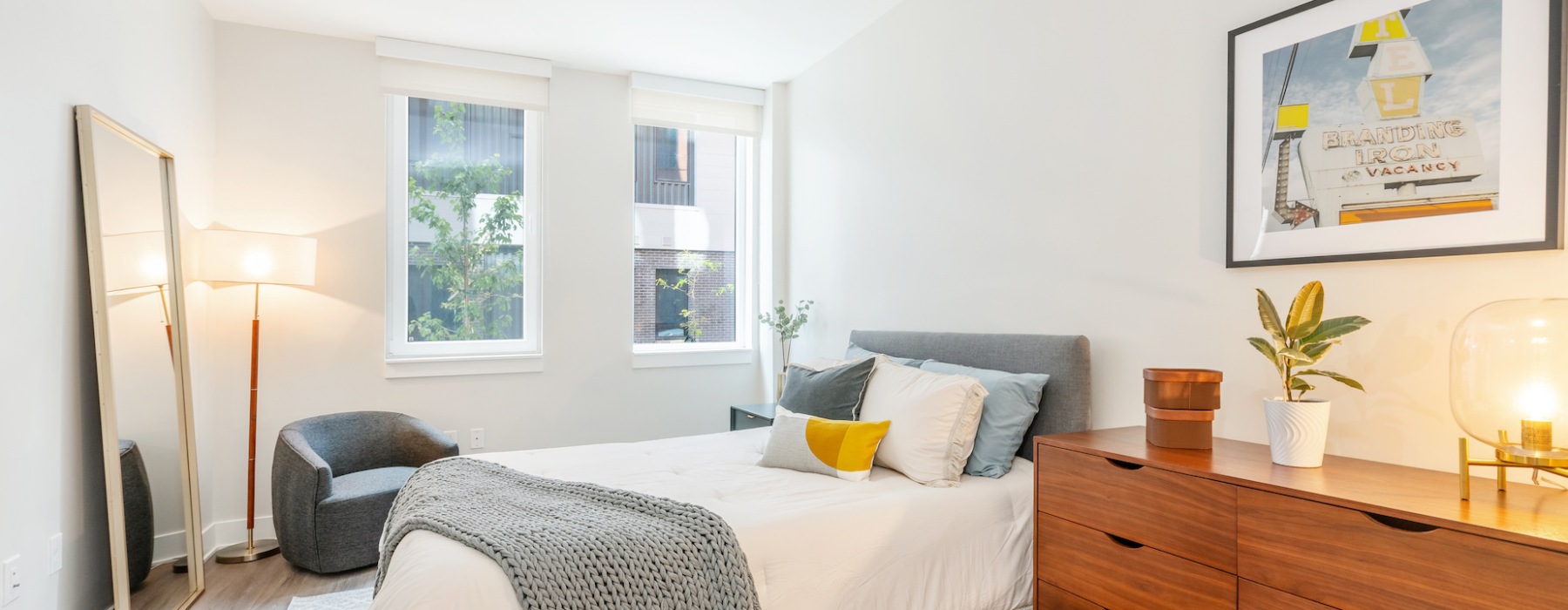 bedroom with bed dresser and window